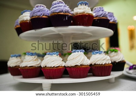 Wedding cake, consisting of small cupcakes, banquet holiday traditions, sweetness