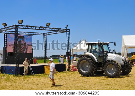 CENTRAL ITALY- JUNE 23: Agricultural fair with free admission, including displays of tractors and agricultural machinery, crowded with farmers and landowners. June 23, 2013 in Latina, Central Italy