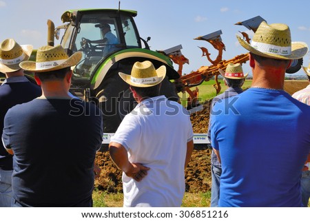 CENTRAL ITALY- JUNE 23:: Agricultural fair with free admission, including displays of tractors and agricultural machinery, crowded with farmers and landowners. June 23, 2013 in Latina, Central Italy.