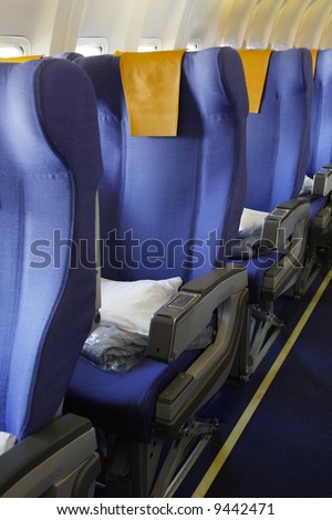 Inside an airplane in econmy class