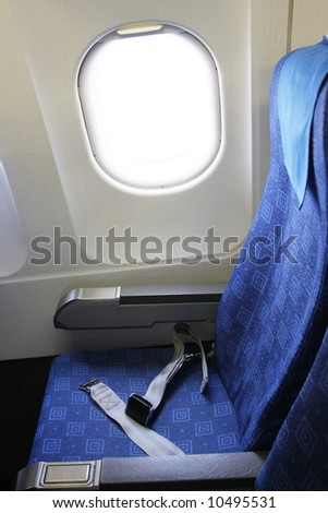 Inside an airplane in econmy class