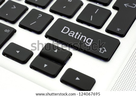 Dating button on the keypad of a laptop