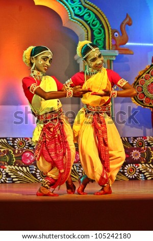 ORISSA, INDIA - NOV 17: 10 years old boys, named as Sudama and Chiku, dress like girls and dance in Gotipua festival November 17, 2011 at Orissa, India. Gotipua is a form of folk Odissi dance