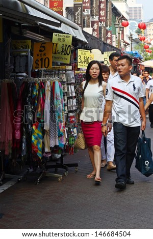 SINGAPORE - JUNE 29: People out for holiday shopping at traditional China Town on June 29, 2013 at China Town, Singapore