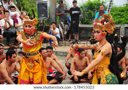 BALI - FEBRUARY 14: Group of Balinese folk dancers play drama on street on February 14, 2014 in Bali, Indonesia