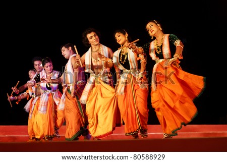 KONARK, INDIA - DECEMBER 04: An unidentified group of professional classical dancers perform dandi dance at Konark temple on December 04, 2010 at Konark, India