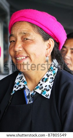 ANDHRA PRADESH, INDIA - OCTOBER 27: An old unidentified Tibetan lady, in proper Tibetan dress, visits India on October 27, 2011 at Nagarjuna Sagar, Andhra Pradesh, India.