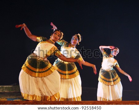 KONARK, INDIA - DECEMBER 04: An unidentified group of professional mohiniyattam dancers perform at Konark temple on December 04, 2011 at Konark, Orissa, India
