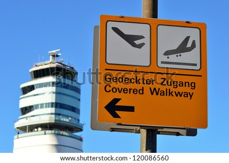 arrival and departure sign with traffic control
