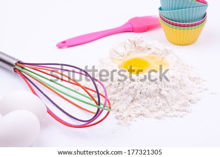 flour,egg,whisk and with cake holders