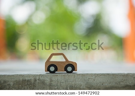 Dream concept. Wooden car model.