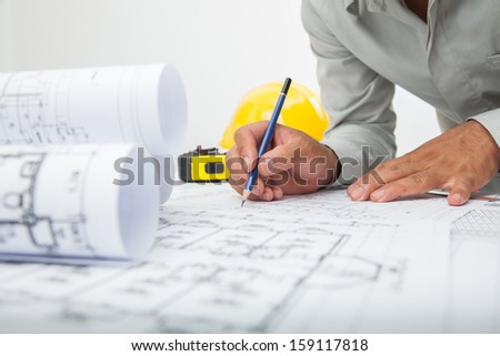 Architect Sketching A Construction Project.