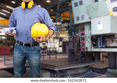 Engineer in the area of the factory.