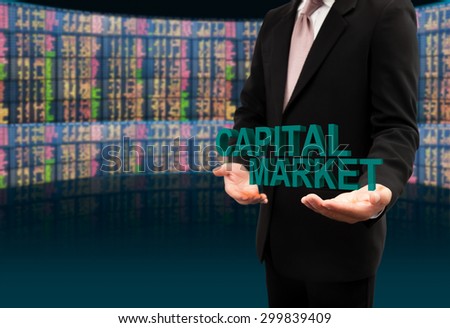 Capital market text on hands businessman.