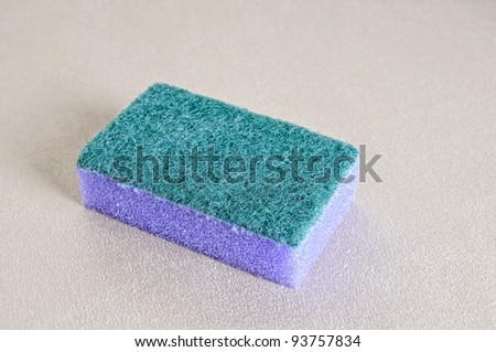 violet-green sponge for washing dishes