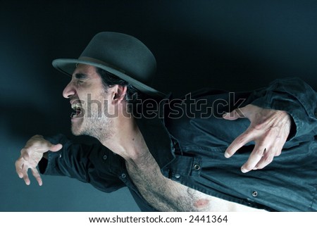 stock photo Scary man with hat
