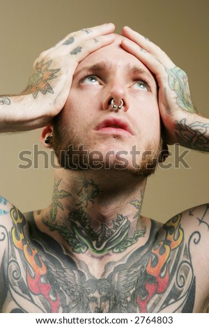 stock photo Tattoo man with headache