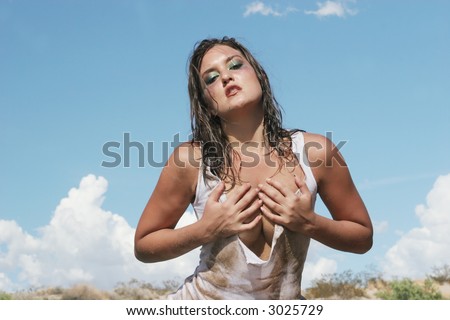 Sexy pretty woman in wet shirt