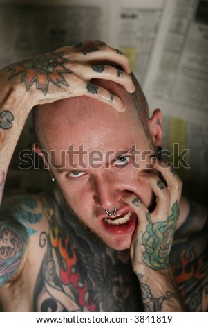 stock photo Sexy angry tattooed man