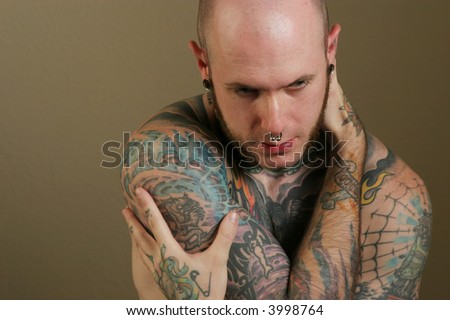 stock photo Sexy tattooed man portrait