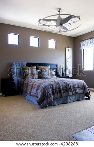 Modern tastefully decorated master bedroom