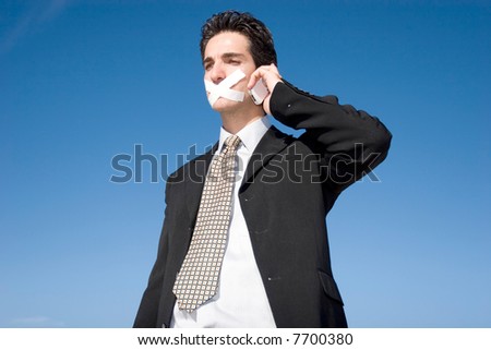 Businessman with a duct tape on his mouth