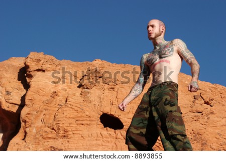 Male model with tattoos on his body