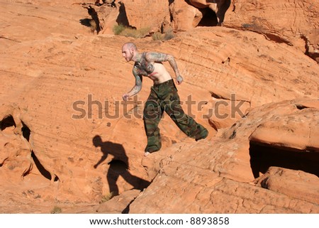 stock photo : Male model with tattoos on his body