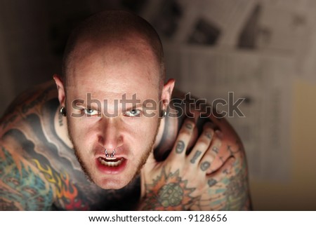 stock photo Angry man with tattoos on his body asian man tattoos