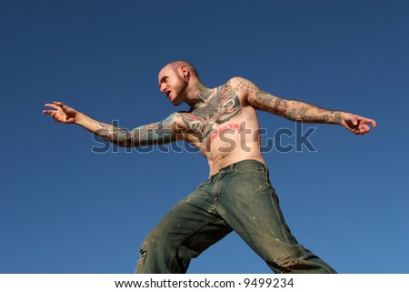 Male model with tattoos on his body