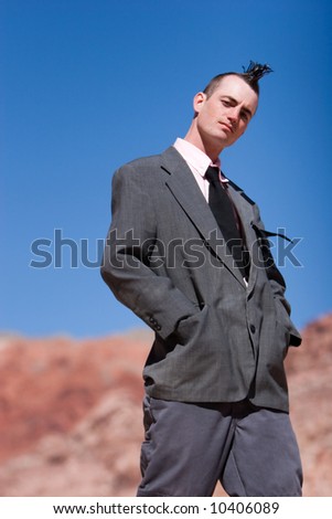Businessman with alternative style haircut and outfit