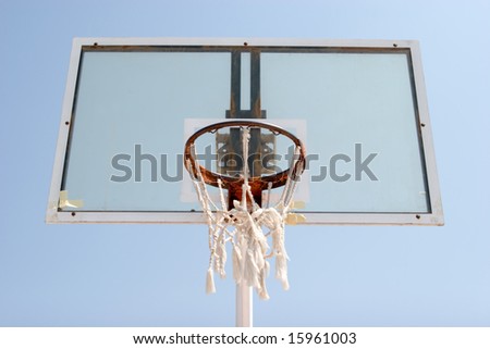 An old basketball hoop with net