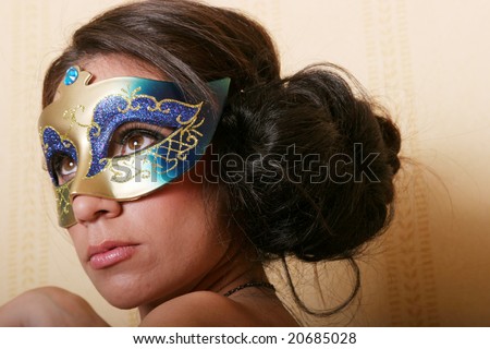 Pretty sexy woman in a carnival mask