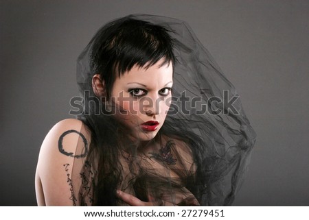 stock photo : Beautiful alternative girl with gothic hairstyle and makeup