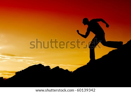 Man silhouette running on mountain top