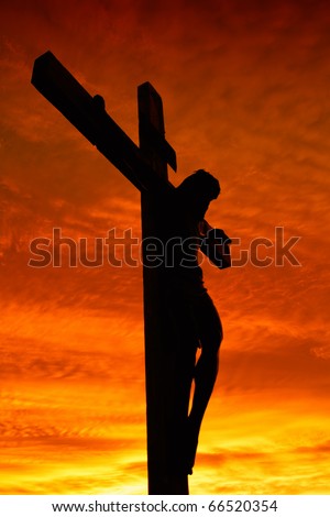 Holy cross at the sunset