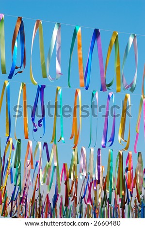 Carnival street decoration ribbons hanging on wires