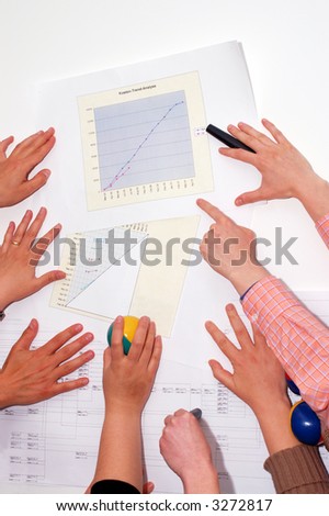 Concept of several hands preparing project workshop