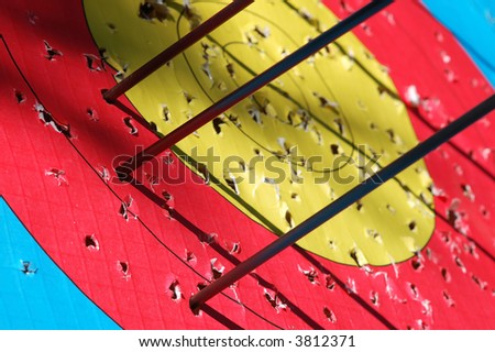Close-up of arrows hitting the target