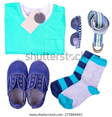 Kid's street casual outfit on white background. Overhead view. Teen's concept. Isolated.
Clear label with a place for your sample text is attached to a t-shirt.