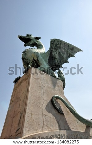 Dragon statue at Zmajski Bridge in Ljubljana, Slovenia