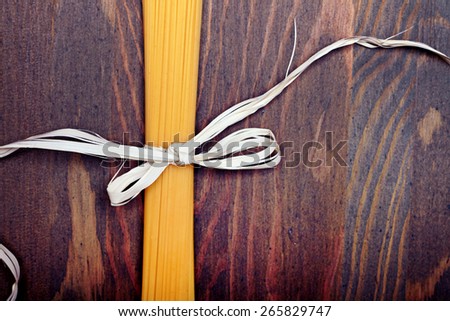 food background - pasta on dark wood table