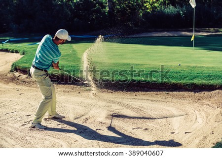 Golf. Sand trap play