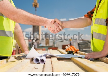 Hanshake seals an agreement at construction site