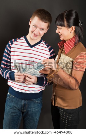 Man and woman with money in hands