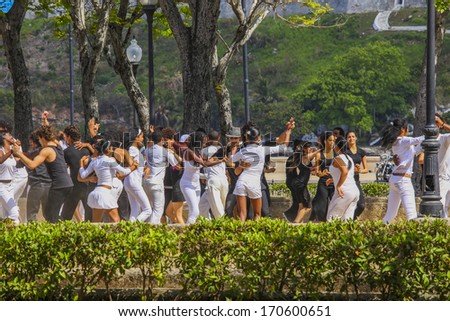 HAVANNA, CUBA-FEBRUARY 21, 2011: Young people dancing in a park in Havanna in Cuba on a movie take