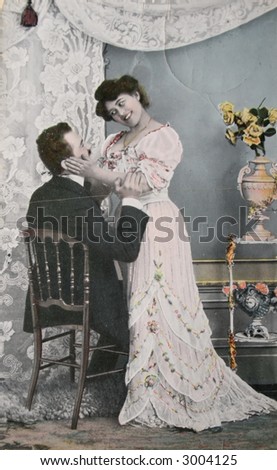 Victorian romance - loving couple  - circa 1908  hand-tinted photograph ,
