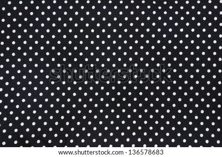 black and white polka dot background