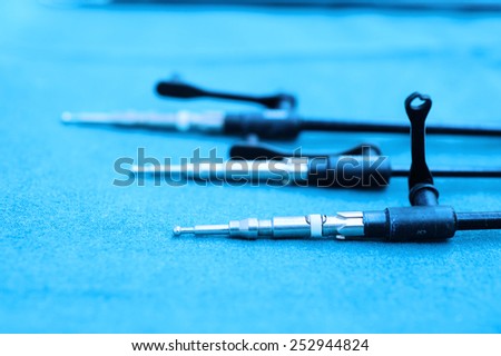 equipment and medical devices in modern operating room take with blue filter