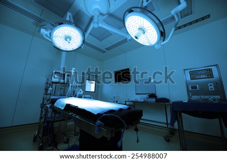 equipment and medical devices in modern operating room operation room take with blue filter